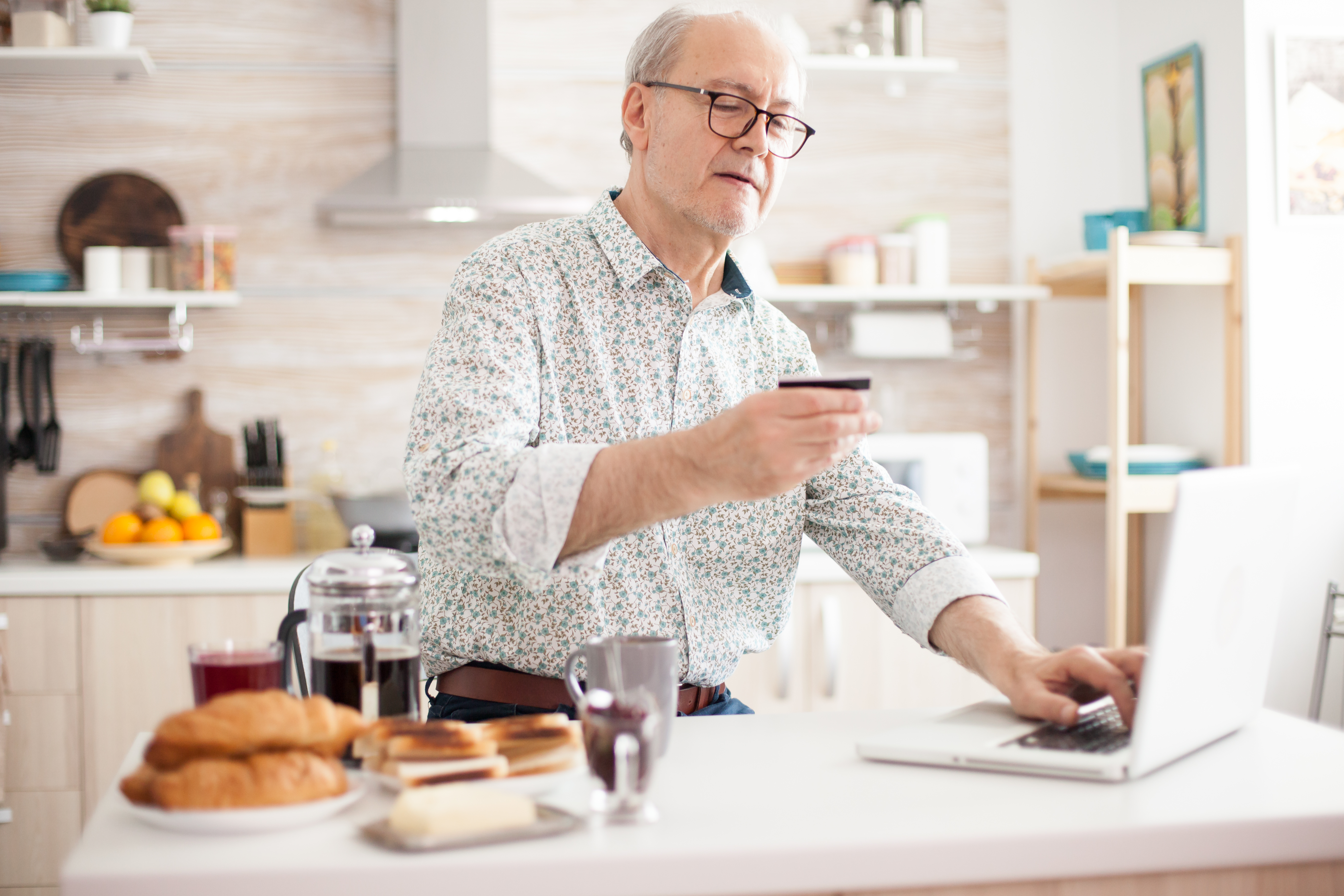 Man paying dental bill online